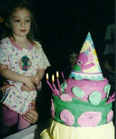 Nikki and her Baby Bop/Barney cake atop a Baby Bop Yellow Blankie Pedestal